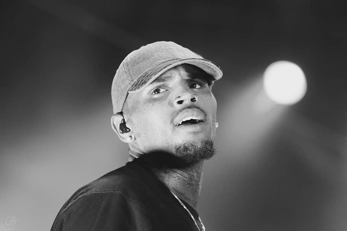 Chris Brown performing on stage during a concert.